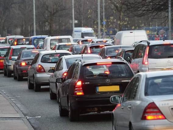 Drivers are held up a minute for every four miles they cover in Northumberland. Picture: PA