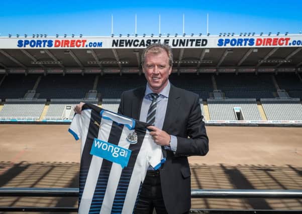 NEWCASTLE UPON TYNE, ENGLAND - JUNE 10:  Newcastle United's New Head Coach Steve McClaren poses for photographs pitch side holding a NUFC shirt at St.James' Park during the Newcastle United Photo call on June 10, 2015, in Newcastle upon Tyne, England. (Photo by Serena Taylor/Newcastle United via Getty Images)