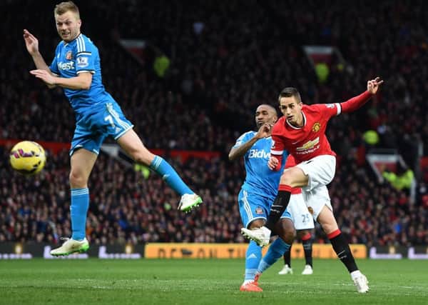 Manchester United's Adnan Januzaj has a shot on goal against Suinderland last season