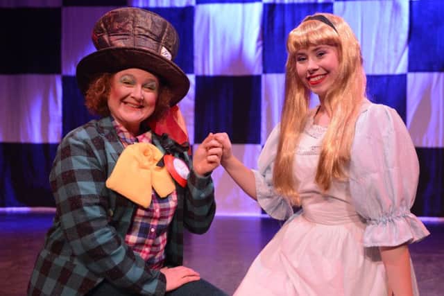 Alice's Adventures is being staged by Alnwick Theatre Club at Alnwick Playhouse.
 The Mad Hatter and Alice
Picture by Jane Coltman