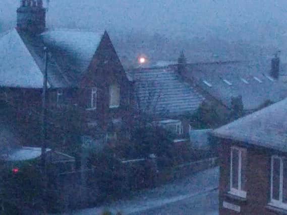 Snow falling in Alnwick at 8am
Picture Jane Coltman