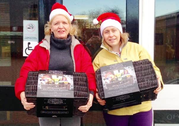 Free donated food hampers delivered by volunteers from CAN on Christmas Eve.