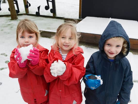 Some of the youngsters having fun in the snow. Picture by Jane Coltman