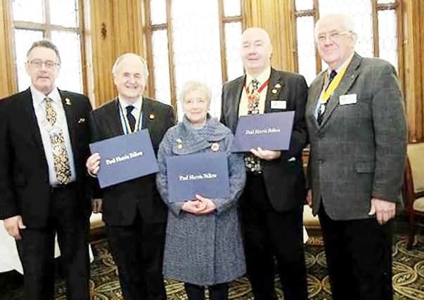 The Rotary Club of Alnwick has presented  'Paul Harris Fellowship Awards' . Pictured are Rotary District Governor Terry Long with Lord Beith, Rotarians Barbara Reid Jim Thompson and Dave Campbell.