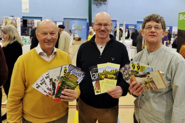 Chamber Of Trade chairman Carlo Biagioni, Alnwick Tourism Association chairman Bruce Hewison and Local Living chairman Philip Angier with some of the many leaflets that were distributed at the 2013 tourism fair at Willowburn Leisure Centre in Alnwick.