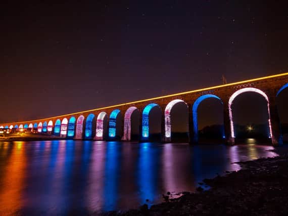 The Royal Border Bridge lit up for Burn's Night and photographed by Dave Sanderson.