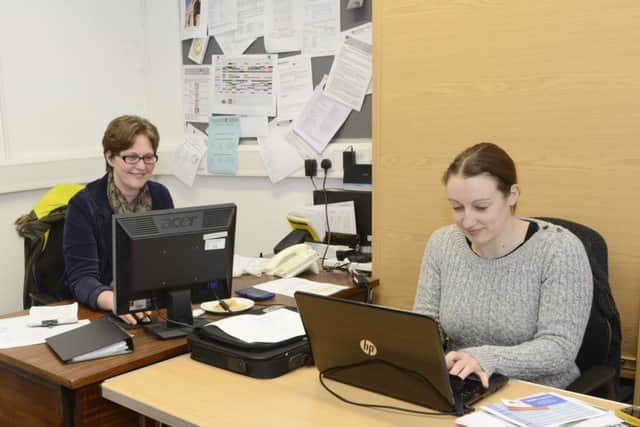Lyndsey Collings and Fliss Tunnard  in the parish office at  St Aidan's Church in Stobhill. Picture by Jane Coltman