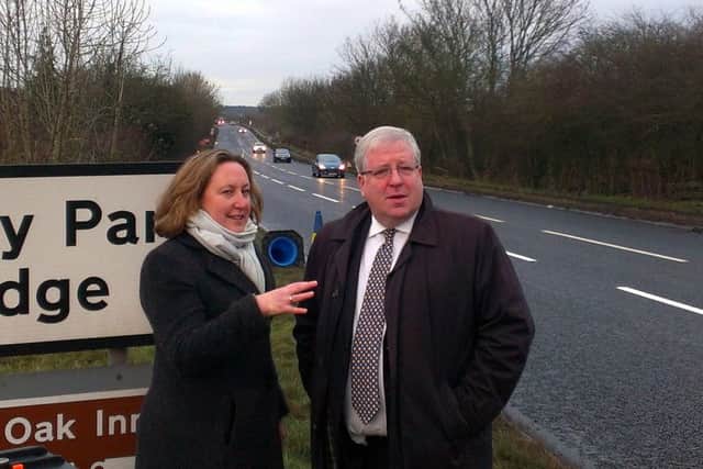 Anne-Marie Trevelyan MP with Transport Minister Patrick McLoughlin beside the A1.