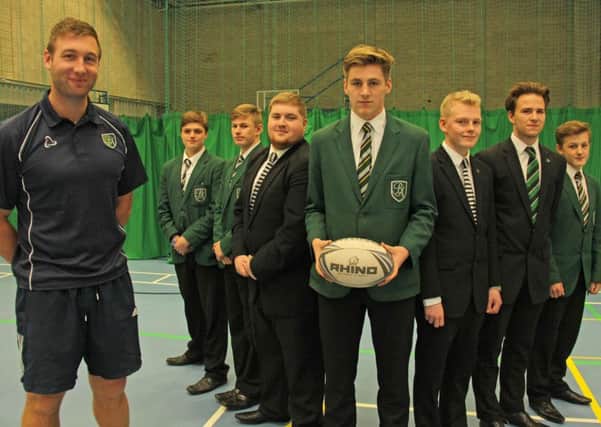 Rugby coach at Bede Academy Andrew Sutherland with county players Luke Giles, Ryan Hull, Jordan Thompson, Tom Marshall, Jay Robinson, Richard Harland and Adrian Wray.