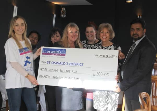 With the cheque are Lauren Thompson (St Oswalds Hospice fund-raiser), Verena Harrigan, Pauline Robinson and Abdul Zabid.