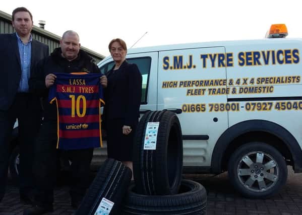 From left: Nick Singleton, from Tyrespot Ltd, Shaun  Jackson, manager of SMJ Tyre Services and Vicki Tillson, UK sales manager for Lassa Tyres.