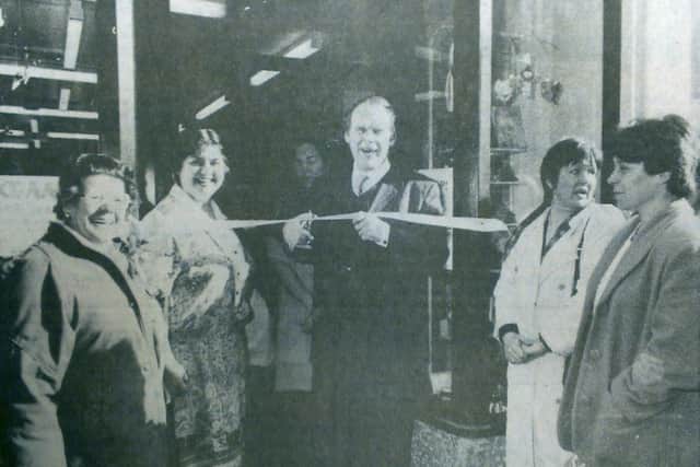 The opening of the Oxfam shop in Alnwick by TV personality Bill Steele in February 1996, as reported by the Northumberland Gazette.