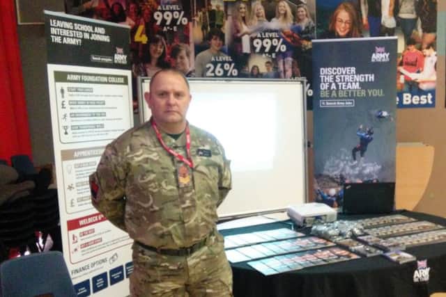 Andrew Robbins at the Army recruitment stand.