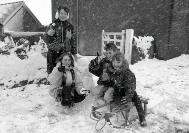 Seahouses children playing in the snow 25 years ago.