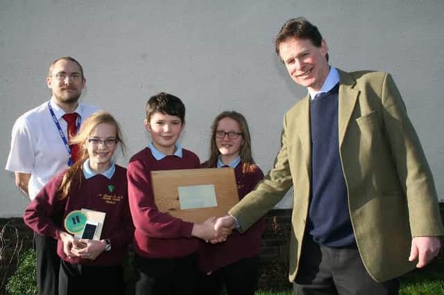 Teacher Tony Palmer, St Mary's Middle School pupils Charlotte Walton, Max Humphreys and Imogen Blythe with Bedmax MD Tim Smalley.