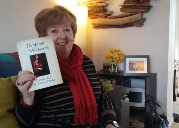 Beryl Holmes with the book.