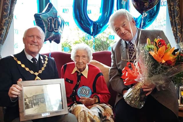 Gladys Murdy celebrates her 100th birthday with guests Amble Mayor Craig Weir and local councillor Jeff Watson.
Picture by James Willoughby