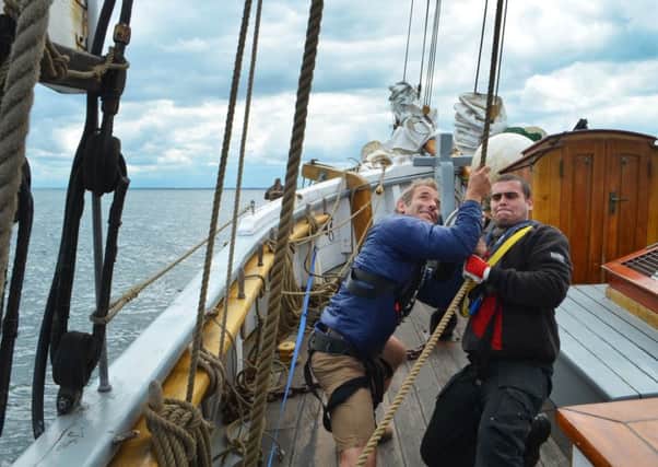Robson Green hoisting the sails during his adventure aboard the tall ship.