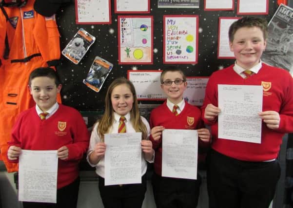 Pupils from the Northumberland Church of England Academy with their letters that they sent to NASA.