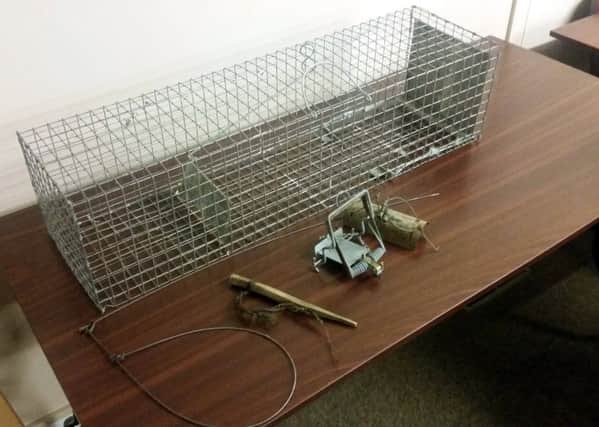 A selection of traps and snares used to catch animals.