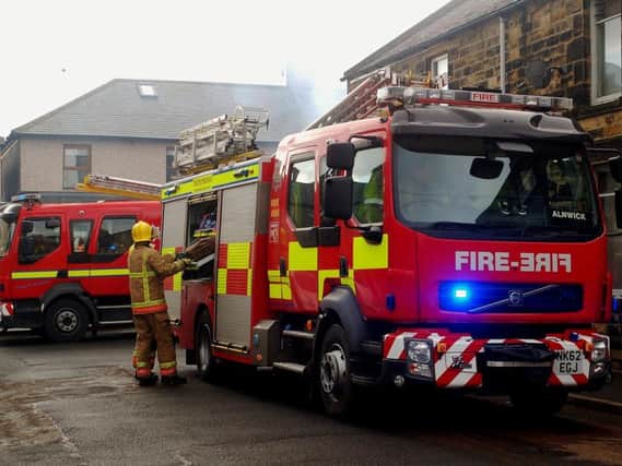 Fire crews at the chimney fire in Alnwick. Picture by Steve Miller
