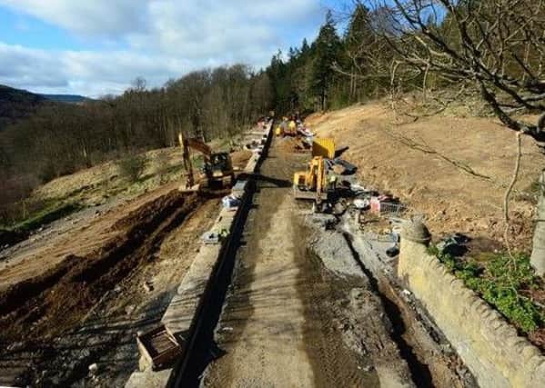 Finishing works to the embankment taking place on the B6344 at Crag End.