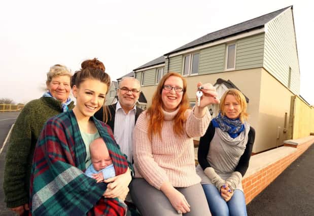 Front, Jayde Stewart and her son Ethan with new neighbour Donna Young and ward councillor Kate Cairns. Back, Coun Heather Cairns, member of the housing and economic growth advisory group, and Coun Allan Hepple, cabinet member responsible for housing.