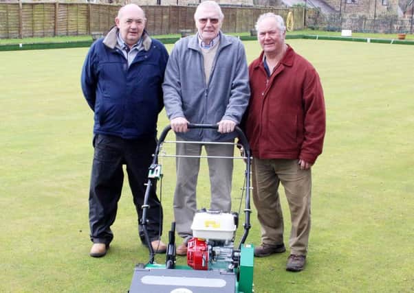 New Automatic Overseeder for Lesbury Bowls Club, left to right: Bob Pringle, John Mitchison, Michael Hinghaugh