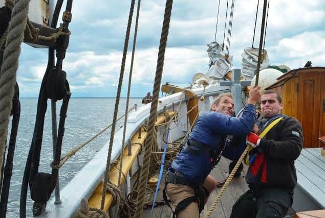 Robson Green hoisting the sails aboard the tall ship.