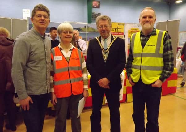 From left, Philip Angier, event manager, Anne Howie, administrator, Alnwick Mayor Bill Grisdale and Raymond Howie, volunteer steward, at the tourism fair. Picture by James Matthewson