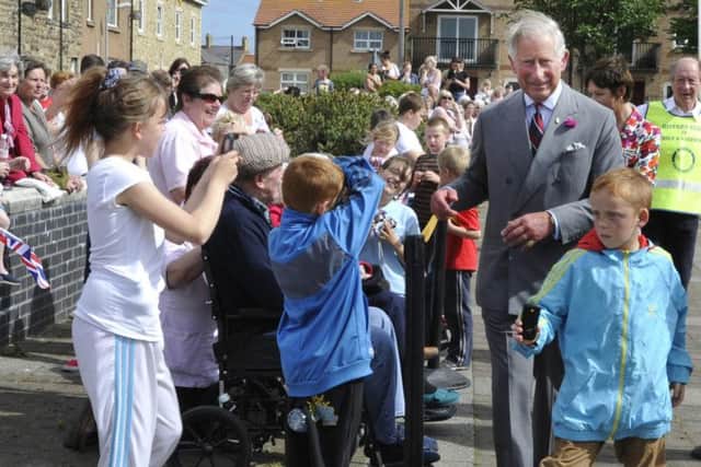 Prince Charles during his visit to Amble in 2012. Picture by Jane Coltman