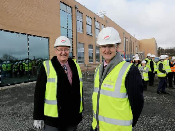 Coun Grant Davey and the Duke of Northumberland outside the new Duchesss Community High School.