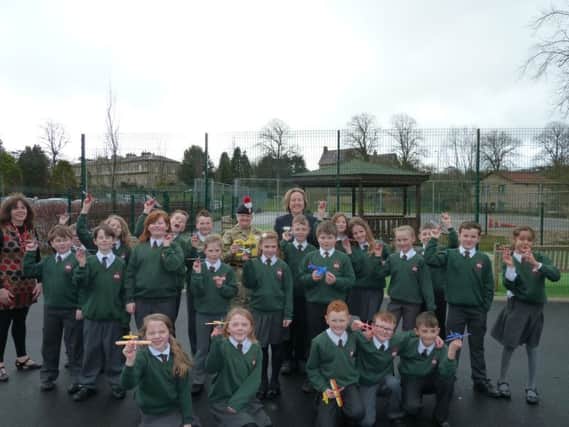 Anne-Marie Trevelyan MP with Lt Colonel Sue Haughie and Year 5 pupils from St Pauls RC Middle School in Alnwick.