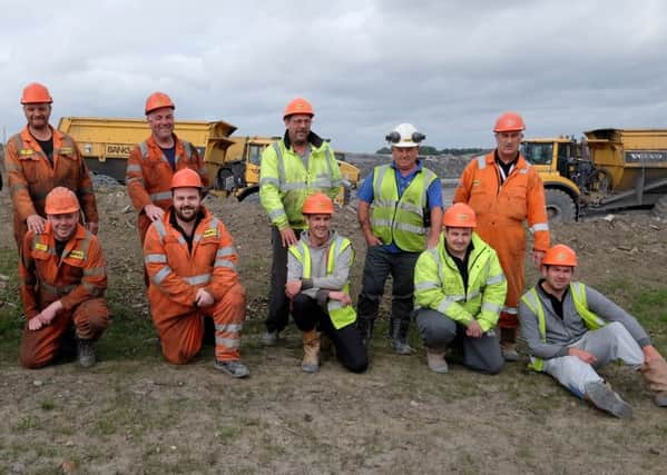 The dads (top row) and lads at Banks Mining's Shotton site, including Andy and Scott Moore, far right, from Widdrington Village. Picture by Keith Taylor