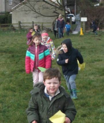 Longhoughton pupils taking part in the sponsored walk.