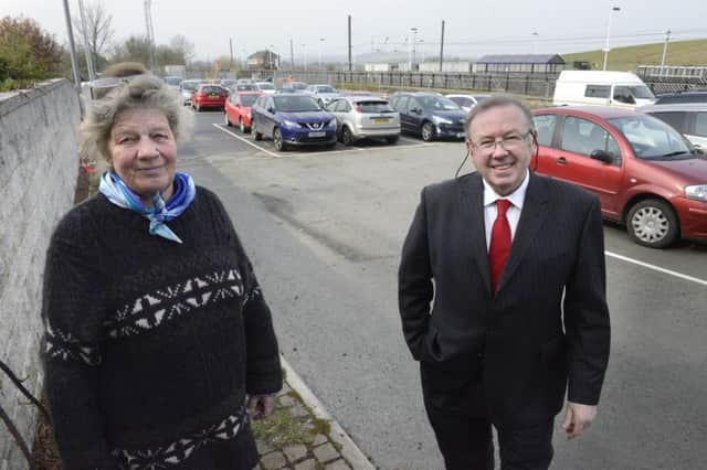 County councillors Heather Cairns and Ian Swithenbank by the new parking spaces at Alnmouth Railway Station.
 Picture by Jane Coltman
