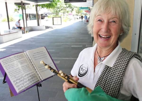 Rosemary Srinivasan busking in Queensland, Australia. Picture courtesy of ABC News