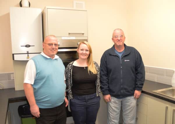 From left, Kevin Batson, Jeannie Kielty of The Banks Group and Charlie Wiggett, a member of the Stobswood Miners' Welfare Recreation Centre committee.