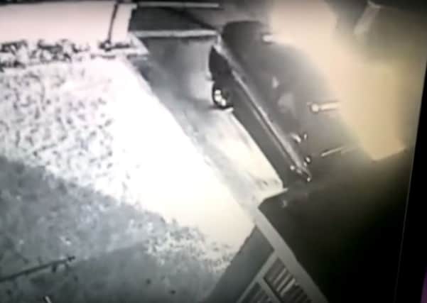 An image taken from the CCTV footage of the arson attack.