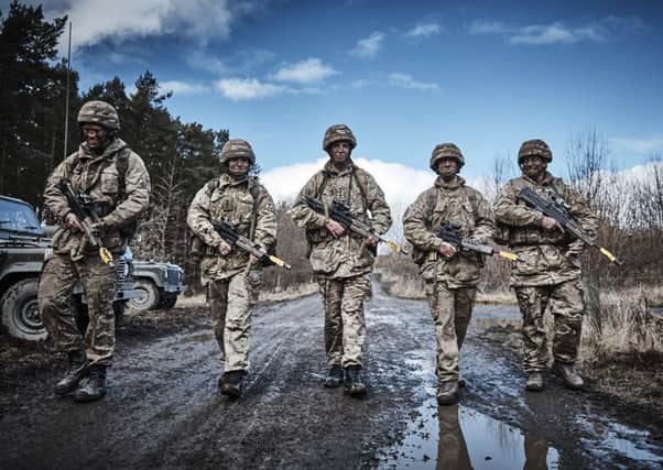 Officers and Soldiers from 101st (Northumbrian) Regiment Royal Artillery patrolling during Exercise STEEL SABRE 16 at Otterburn Training Area. Picture by Jonny Thompson.
