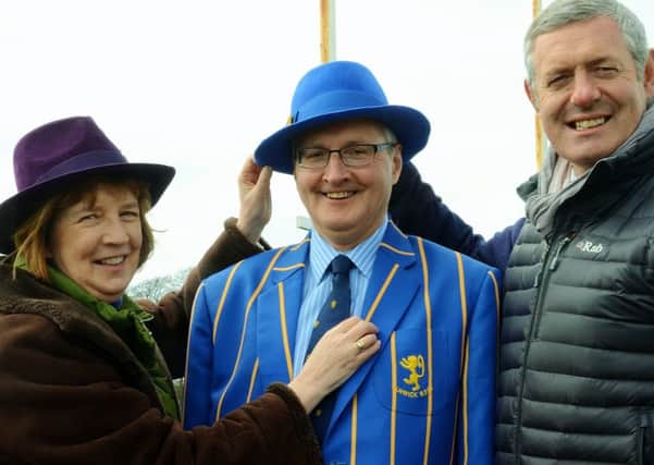 From left: Margaret Woodliff Wright, Alnwick Rugby Club chairman Dennis Hetherington with his trilby and Scotland rugby legend Gavin Hastings OBE. Picture by Steve Miller