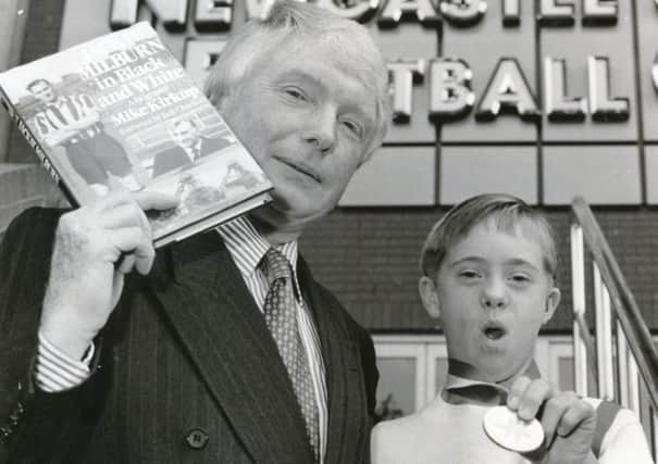 Mike Kirkup pictured in 1990 with Paul Stearman, the first recipient of a grant from the Jackie Milburn Memorial Fund for disadvantaged North East Children.
