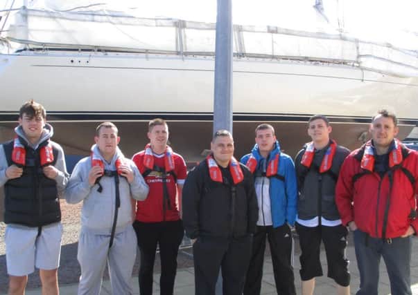 Students wearing their personal flotation devices, paid for by Seafish and other maritime bodies, before heading off to sea from Amble Marina for a trip up the Northumberland coast.