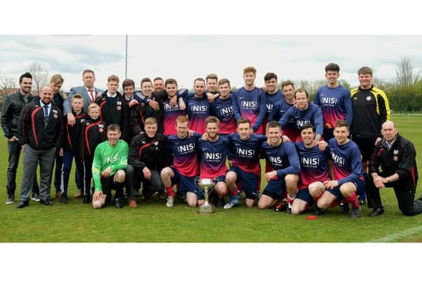 Amble Tavern players and management after winning the NFA Justsport Sunday Cup. Picture by Steve Miller