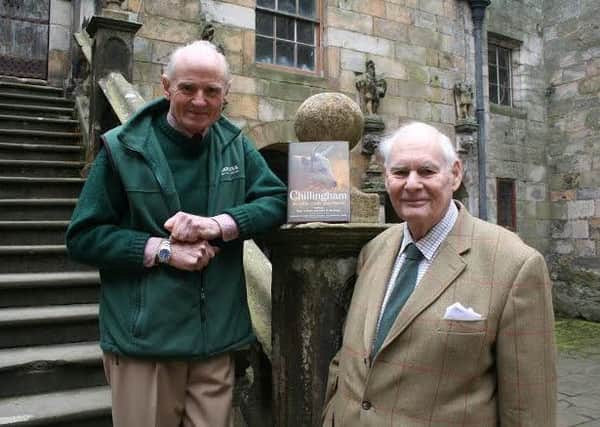 Sir Humphry Wakefield and Philip Deakin with the new book about Chillingham.