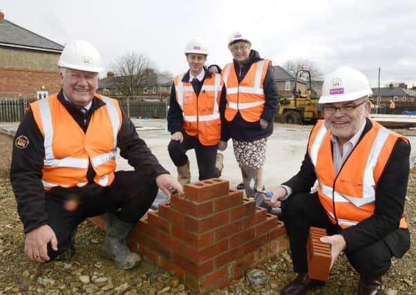 Northumberland County Councillors Kath Nisbet and Alan Hepple with Jonathan Parker and Ian Swainston from Esh Property Services at the Morpeth Road site in Blyth,