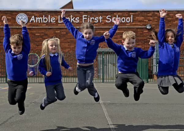 Pupils at Amble Links First School celebrate their Ofsted report.
Picture by Jane Coltman