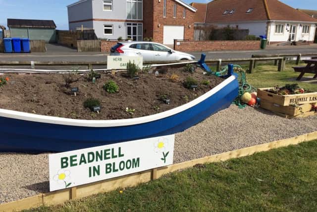 The coble Beadnell Lass has been transformed into a herb garden.