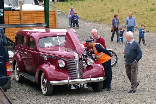 Aln Valley Railway vintage traction event.Picture Mark Hayton
Terry Grahamslaws 1937 Pontiac Silver Streak Straight 8 Station Wagon being admired by Chris Freeman of the AVR