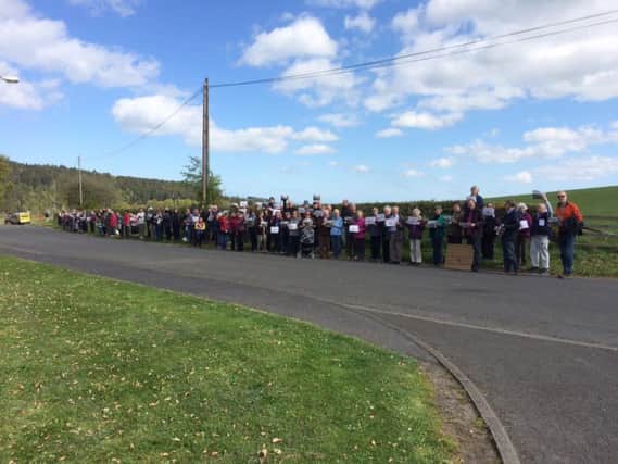 Protesters starting to gather in Rothbury at yesterday's demonstration.